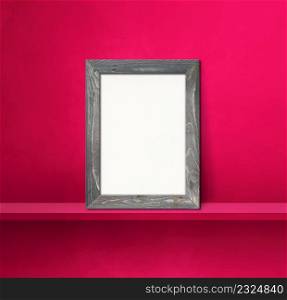 Wooden picture frame leaning on a pink shelf. 3d illustration. Blank mockup template. Square background. Wooden picture frame leaning on a pink shelf. 3d illustration. Square background