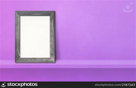 Wooden picture frame leaning on a purple shelf. 3d illustration. Blank mockup template. Horizontal banner. Wooden picture frame leaning on a purple shelf. 3d illustration. Horizontal banner