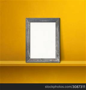 Wooden picture frame leaning on a yellow shelf. 3d illustration. Blank mockup template. Square background. Wooden picture frame leaning on a yellow shelf. 3d illustration. Square background