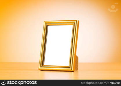 Wooden picture frames on the gradient background