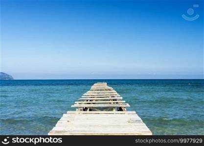 Wooden pier on a beach in mallorca