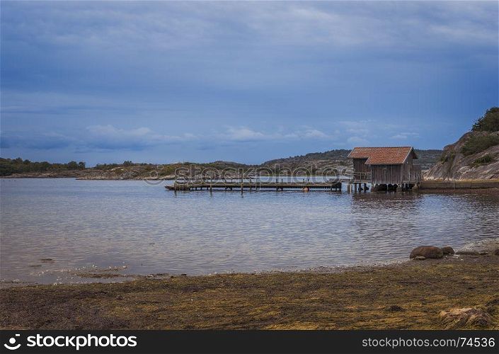 wooden pier on the swedish coast near stromstad