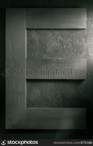 wooden plank board at black background texture