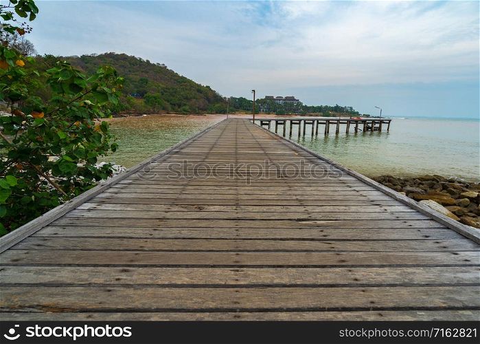 wooden plank pier bridge at Khao Laem Ya in Mu Ko Samet National Park, Rayong Province, Thailand