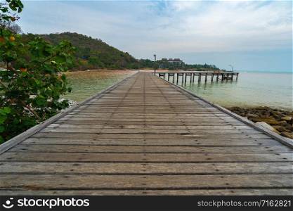 wooden plank pier bridge at Khao Laem Ya in Mu Ko Samet National Park, Rayong Province, Thailand