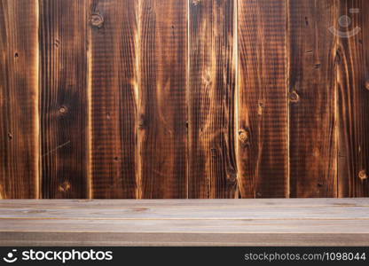 wooden plank shelf at wall background