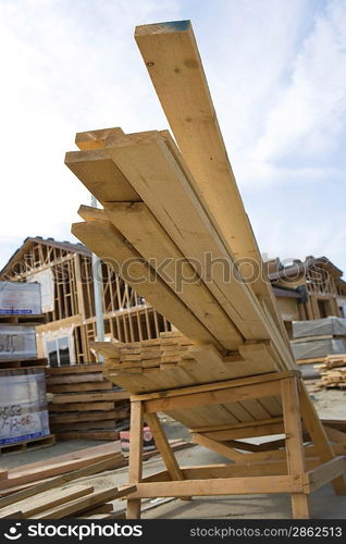 Wooden planks on pile on construction site