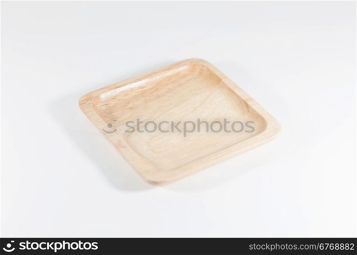 Wooden plate isolated on white background, stock photo