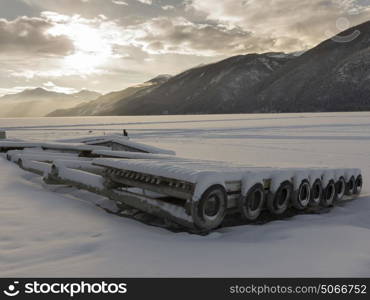 Wooden platform in snow, Muncho Lake, Muncho Lake Provincial Park, Northern Rockies Regional Municipality, British Columbia, Canada