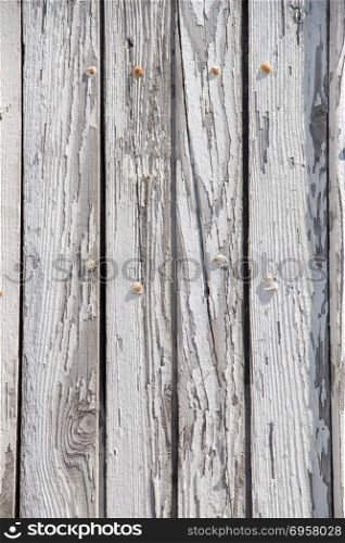 Wooden plunks as background. Texture details of an old wooden plunks as background