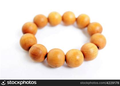 Wooden prayer beads on a white background