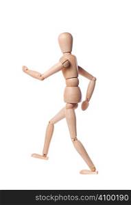 Wooden puppet in a jogging position