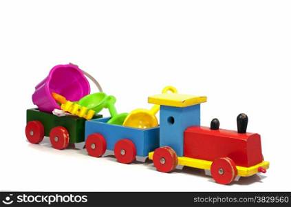 wooden red and yellow train to the beach with toys