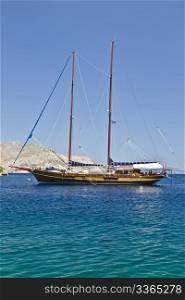 Wooden sailing boat in Aegean Sea