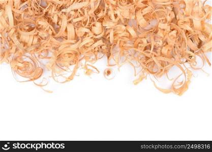 Wooden shavings border isolated on white background. Top view.