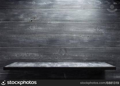 wooden shelf at black background texture