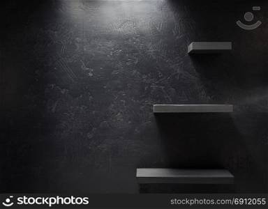 wooden shelf at black wall background
