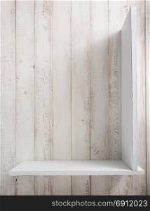wooden shelf at white wall background texture