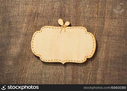 wooden sign board at wooden background . wooden sign board at wooden background surface