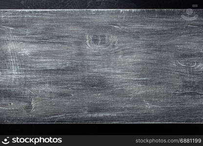 wooden signboard at black background texture