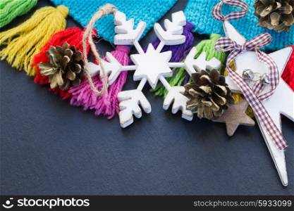 wooden snowflake . white wooden retro snowflake and christmas decorations on black background with copy space