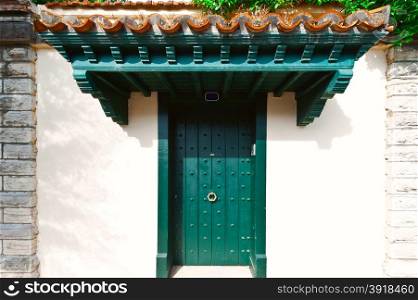 Wooden Spanish Door in the Small City