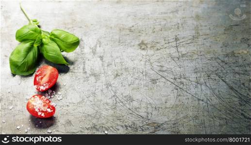 Wooden spoon and ingredients on old background. Vegetarian food, health or cooking concept. Background layout with free text space.