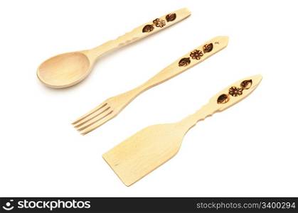 Wooden spoon, fork, spatula isolated on a white background.