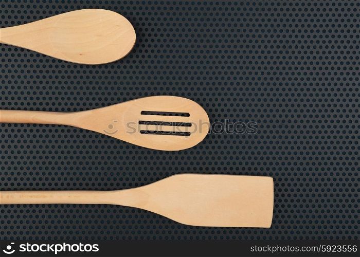 wooden spoon is handmade on a dark background