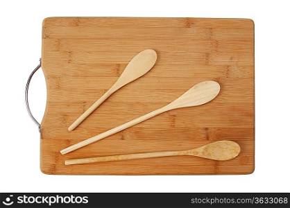 wooden spoon on the kitchen bamboo cutting board isolated on a white background