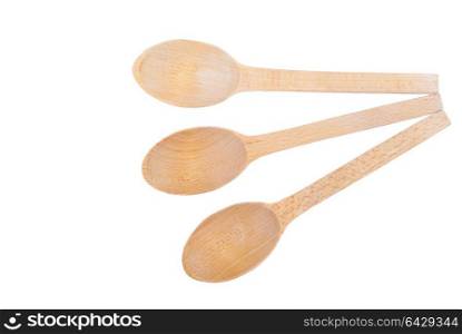 Wooden spoons isolated on a white background.