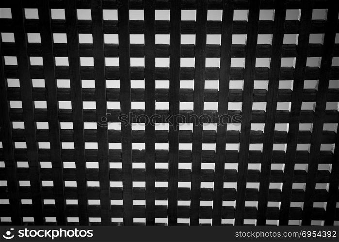 Wooden square grid - abstract black and white.