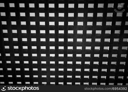 Wooden square grid - abstract black and white.