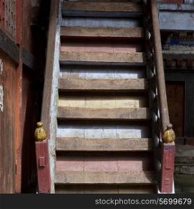 Wooden staircase in Wangdichholing Palace Bumthang District, Bhutan