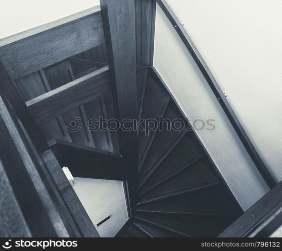 Wooden stairs in a modern house, New and clean black and white close-up , home interior oak wood. Wooden stairs in a modern house, New and clean black and white close-up