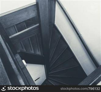 Wooden stairs in a modern house, New and clean black and white close-up , home interior oak wood. Wooden stairs in a modern house, New and clean black and white close-up
