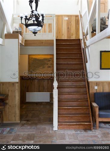 Wooden stairs in an old dutch house, selective focus