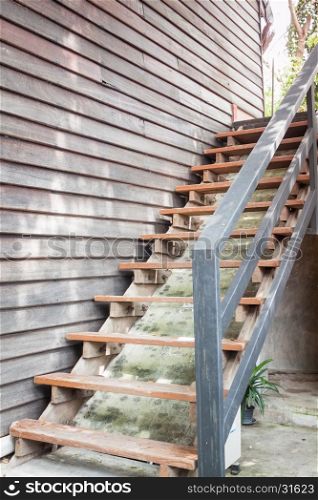 Wooden stairs in coffee shop, stock photo