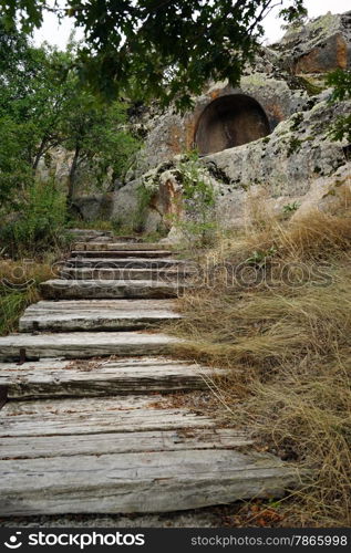 Wooden steps to rock tomb in Midas, Turkey