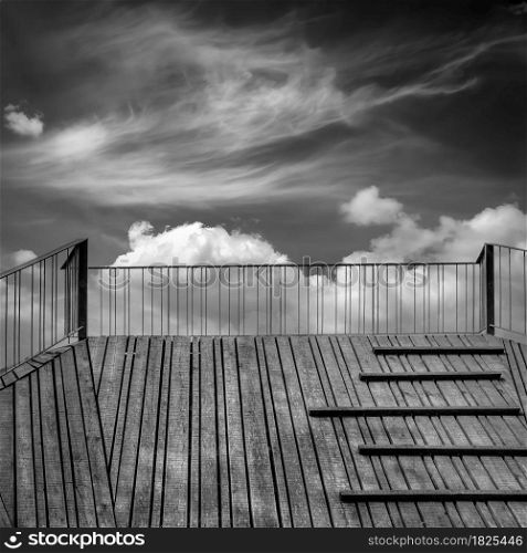 Wooden structure fragment under blue - cloudy sky. Wooden planks construction. Koknese, Latvia.