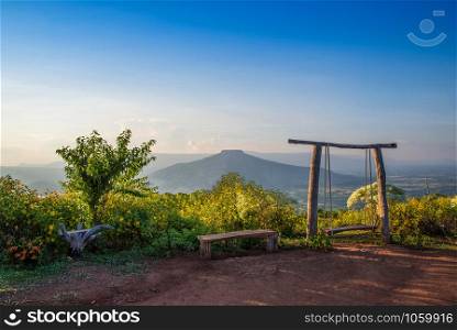 wooden swing on hill landscape view beautiful mountian background