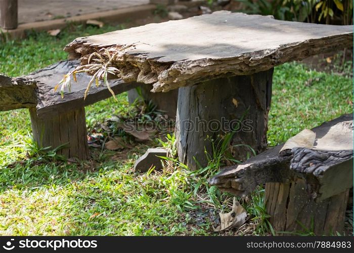 Wooden table decorated in garden, stock photo