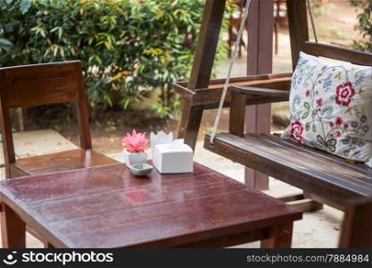 Wooden table decorated in restaurant, stock photo