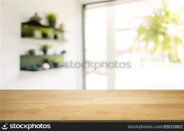 wooden table in front of blurred background of coffee shop cafe