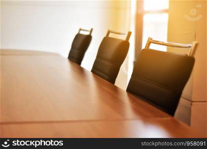 Wooden table in meeting room for business meeting and marketing plan.