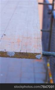 Wooden table of an industrial scaffold, close up