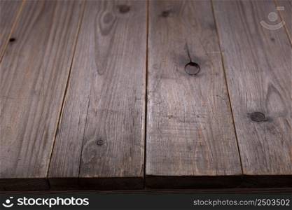 Wooden table top background texture. Wood tabletop front view with copy space. Plank board surface