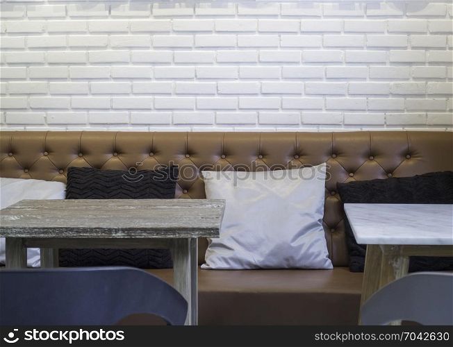 Wooden table top in coffee shop interior, stock photo