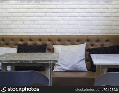 Wooden table top in coffee shop interior, stock photo