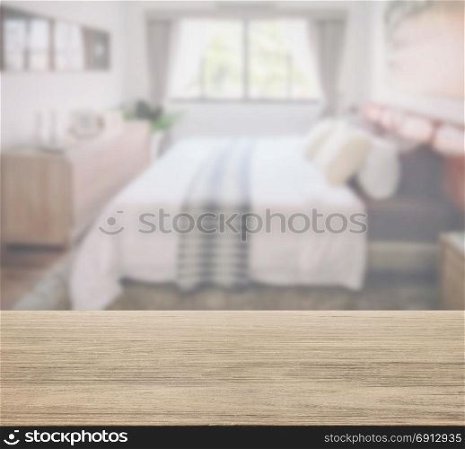 wooden table top with blurred background bedroom in classic style interior